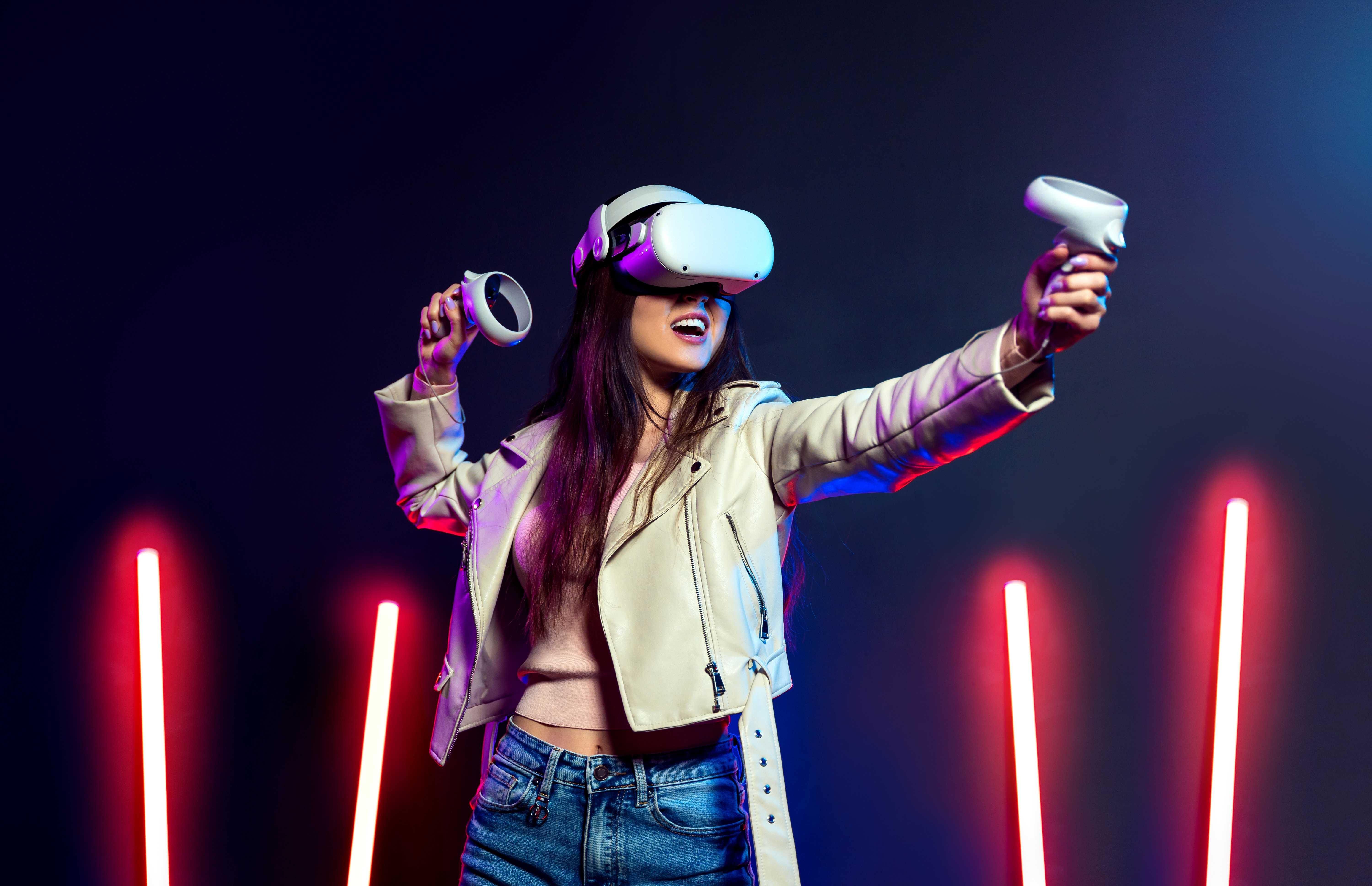 A person using a VR headset with VR controllers