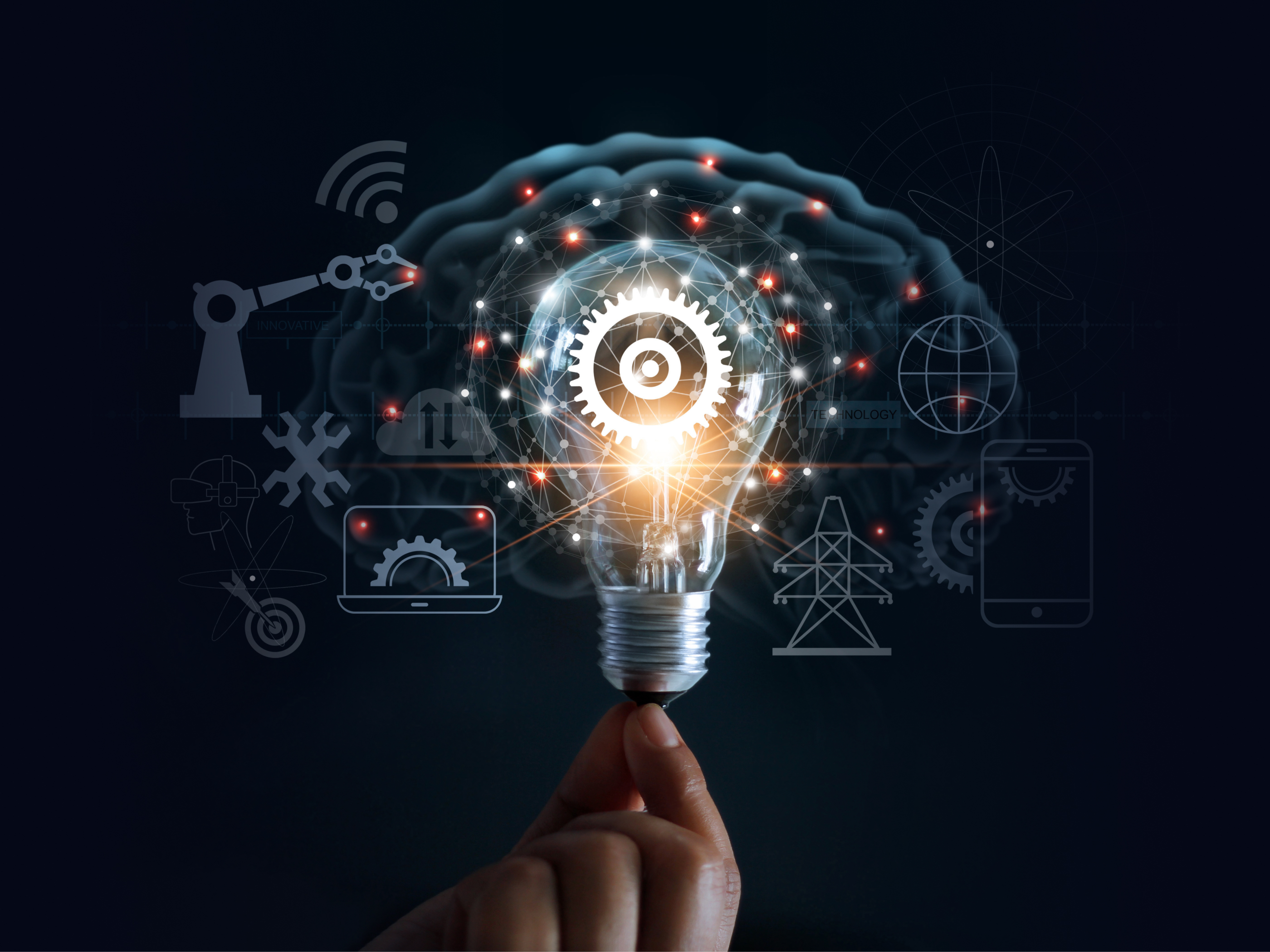 A lightbulb overlapping a brain with pictograms surrounding it